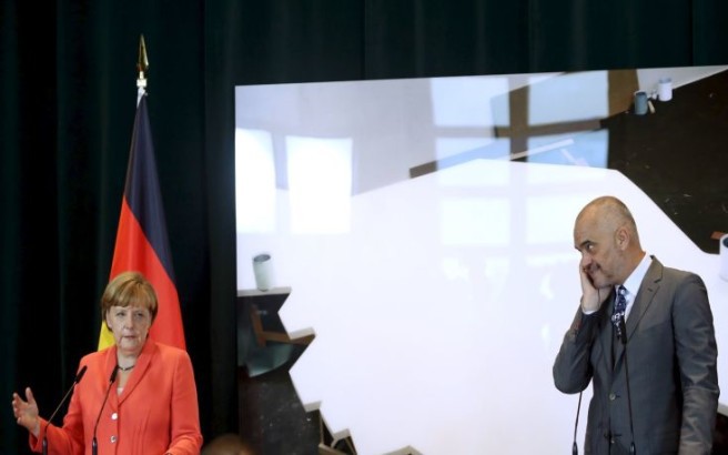 German Chancellor Angela Merkel (L) speaks during a news conference with Albanian Prime Minister Edi Rama after their meeting in Tirana, Albania, July 8, 2015.         REUTERS/Arben Celi