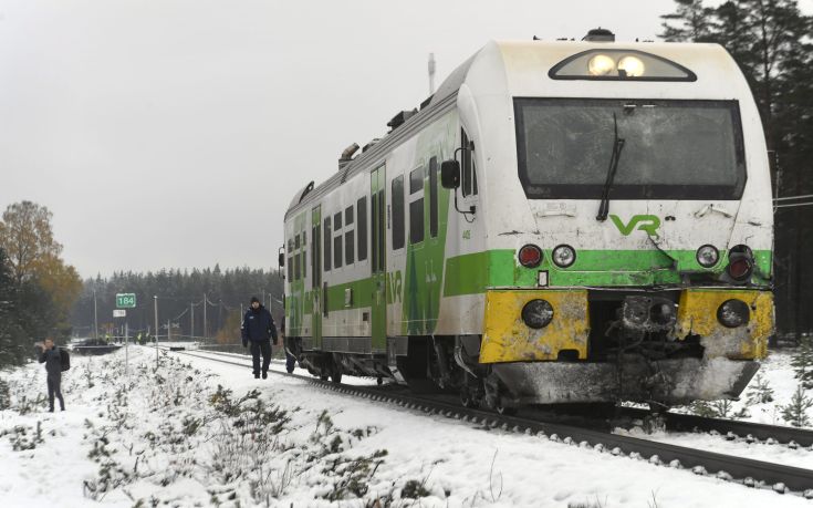 A police officer walks alongside a train that was involved in a crash with a military truck in which several people were killed in southern Finland Thursday Oct. 26, 2017. Finnish media say several people have been killed in a train crash in the southern part of Finland. (Lehtikuva via AP) A police officer walks alongside a train that was involved in a crash with a military truck in which several people were killed in southern Finland Thursday Oct. 26, 2017. Finnish media say several people have been killed in a train crash in the southern part of Finland. (Lehtikuva via AP)