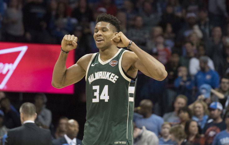 Milwaukee Bucks forward Giannis Antetokounmpo (34) celebrates after the NBA basketball game against the Oklahoma City Thunder in Oklahoma City, Friday, Dec.29, 2017. The Bucks defeated the Thunder 97-95. (AP Photo/J Pat Carter) Milwaukee Bucks forward Giannis Antetokounmpo (34) celebrates after the NBA basketball game against the Oklahoma City Thunder in Oklahoma City, Friday, Dec.29, 2017. The Bucks defeated the Thunder 97-95. (AP Photo/J Pat Carter)