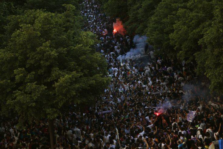 Real Madrid supporters light flares as they cheer outside the team's Santiago Bernabeu stadium prior to the Champions League final match between Real Madrid and Liverpool being played in Kiev, Ukraine, in Madrid, Saturday, May 26, 2018. (AP Photo/Francisco Seco) Real Madrid supporters light flares as they cheer outside the team's Santiago Bernabeu stadium prior to the Champions League final match between Real Madrid and Liverpool being played in Kiev, Ukraine, in Madrid, Saturday, May 26, 2018. (AP Photo/Francisco Seco)