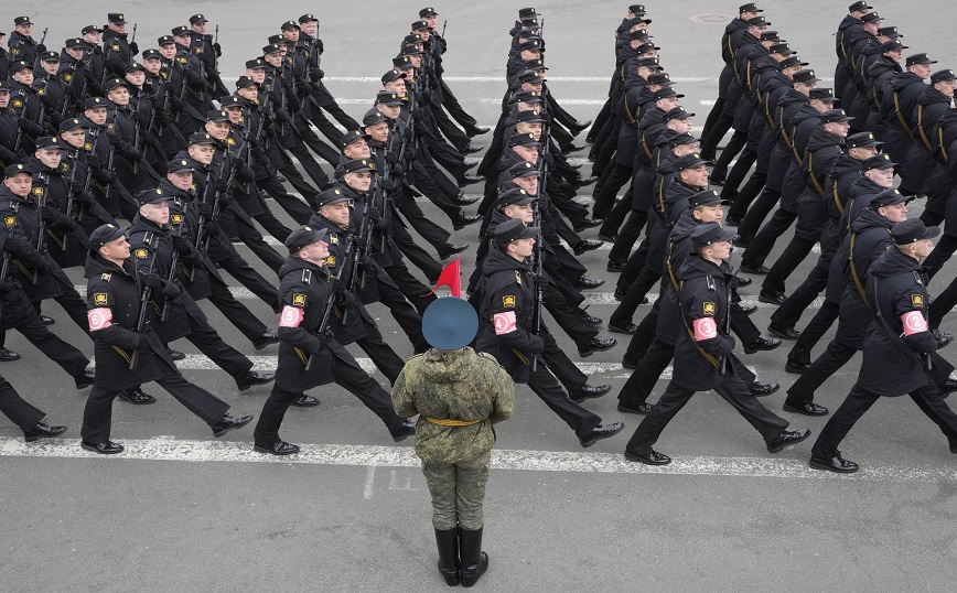 Troops march during a rehearsal for the Victory Day military parade which will take place at Dvortsovaya (Palace) Square on May 9 to celebrate 77 years after the victory in World War II in St. Petersburg, Russia, Thursday, May 5, 2022 Troops march during a rehearsal for the Victory Day military parade which will take place at Dvortsovaya (Palace) Square on May 9 to celebrate 77 years after the victory in World War II in St. Petersburg, Russia, Thursday, May 5, 2022