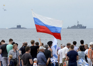 People gather to watch celebrations for Navy Day in Vladivostok