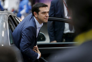 Greece's Prime Minister Alexis Tsipras arrives at a euro zone leaders summit in Brussels, Belgium, July 12, 2015. Euro zone leaders will fight to the finish to keep near-bankrupt Greece in the single currency on Sunday after the European Union's chairman canceled a planned summit of all 28 EU leaders that would have been needed in case of a "Grexit".   REUTERS/Francois Lenoir
