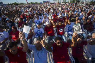 People attend an event paying tribute to Cuban Revolution hero Ernesto “Che” Guevara marking the 50th anniversary of his death in Santa Clara, Cuba, Sunday, Oct. 8, 2017. (AP Photo/Desmond Boylan)